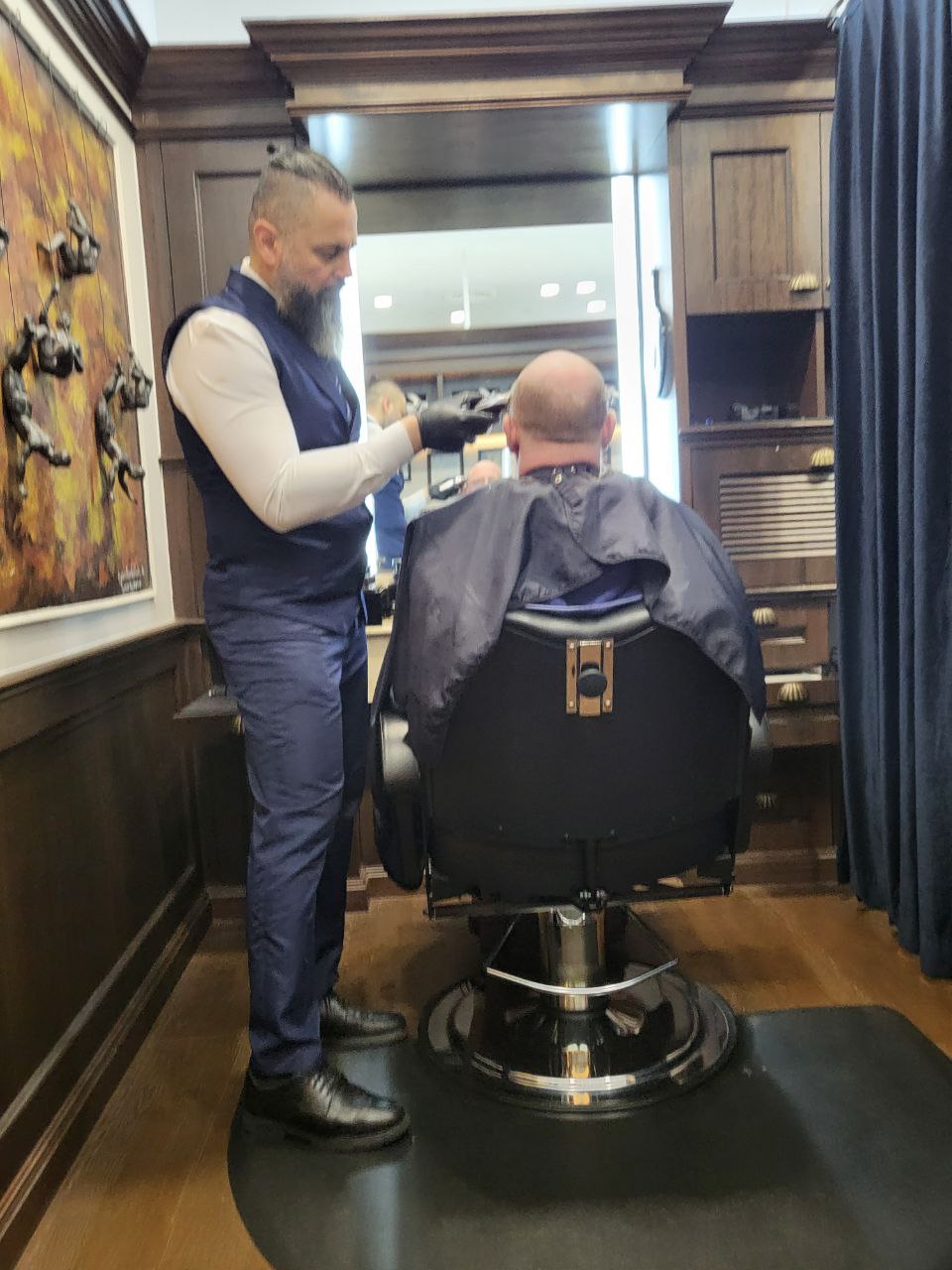 Michael Galloway in the barbers chair Kuala Lumpur