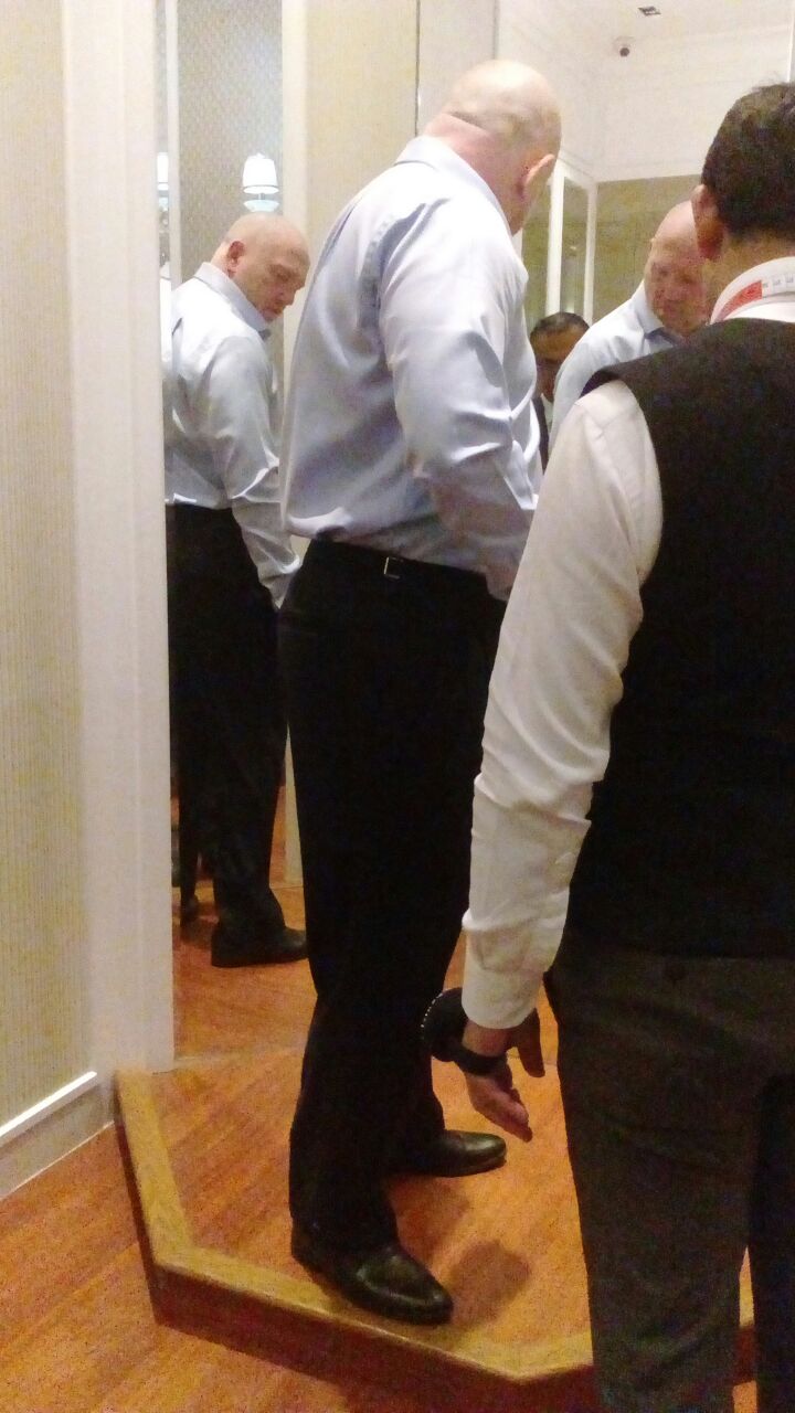 Michael Galloway tailors fitting room